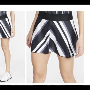 Like new NikeCourt dry fit skirt with attached shorts small, black, white, grey